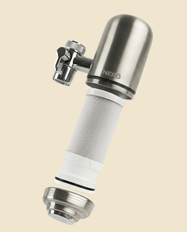 The NERŌ cartridge and the stainless steel filter body, shown apart